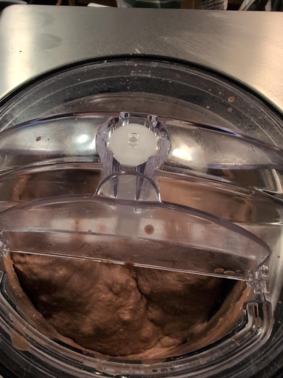 Finished gelato mounding around the machine paddle
